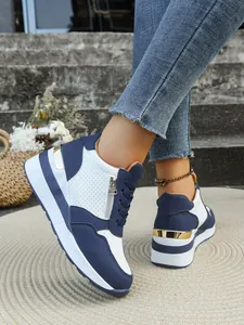 Eleganti sneaker platform blu navy e bianche con cerniera laterale e accenti dorati