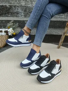 Vista dettagliata delle sneakers platform da donna con mesh traspirante e dettagli con zip