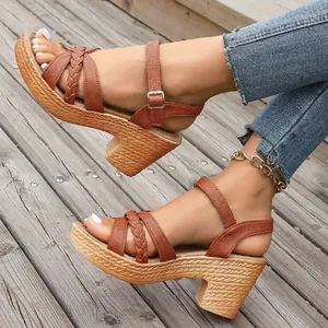 Stylish brown chunky heel sandals featuring braided straps and adjustable ankle buckle strap