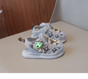 Detail view of grey glowing toddler sandals with breathable mesh and cartoon cat motif