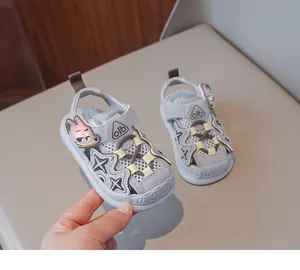 Close-up of toddler light-up sandals with mesh breathability and cute cartoon design