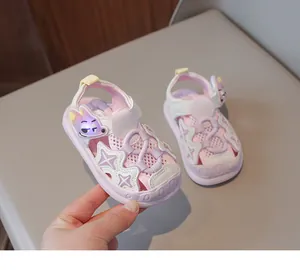 Close-up of pink light-up toddler sandals with mesh breathable material for kids