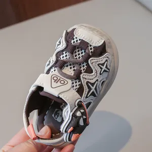 Breathable closed-toe toddler sandals featuring velcro straps and cute cartoon star patterns