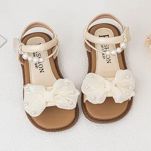 Elegante beige Mädchen-Prinzessin-Sandalen mit großer Perlenschleife und Perlenriemen