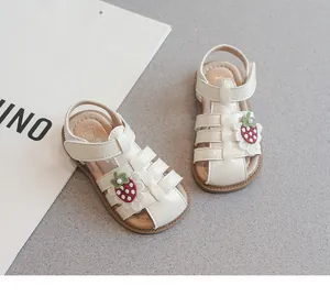 Girls' white closed-toe sandals with strawberry applique and soft sole for babies