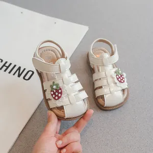 White girls closed-toe sandals with strawberry detail and soft non-slip soles