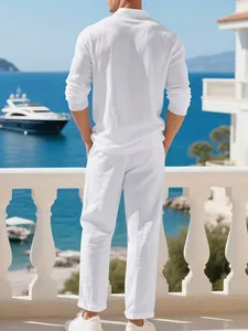 Back view of men's white linen long sleeve shirt and pants set at a beach resort.