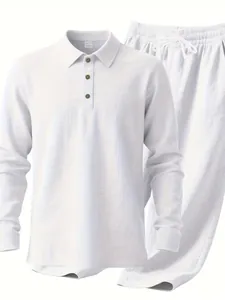 Macro view of white linen long sleeve shirt and matching trousers set with textured fabric
