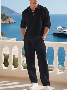 Men's casual black linen two-piece set with a long sleeve polo and loose trousers.