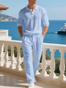 Men's light blue linen set with long sleeve polo shirt and matching trousers for beach