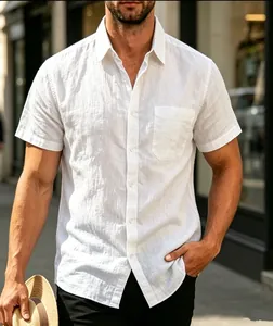 Detail of a men's white linen short-sleeved shirt with a chest pocket and button front