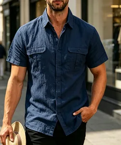 Close-up detail of navy blue jacquard short-sleeved casual shirt with chest pockets