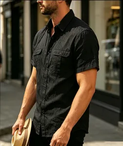 Close-up of stylish black men's jacquard short sleeve casual shirt with chest pockets