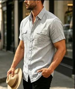 Close-up of light grey short sleeve linen shirt with dual chest pockets for men