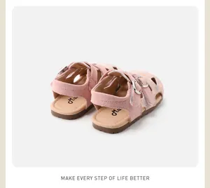 Rear view detail of pink floral toddler sandals featuring a soft sole and secure buckle straps.