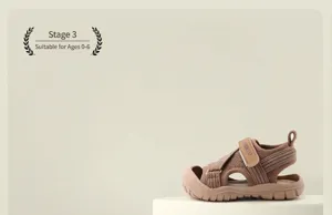 Side view of breathable brown mesh kids sandal with velcro closure for children.