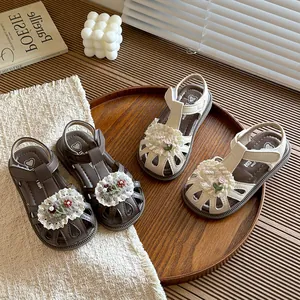 Sweet children's floral sandals featuring soft soles and delicate lace detailing for girls