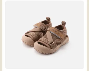 Close-up of brown knit children's sport sandals with protective closed-toe and velcro
