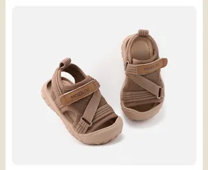 Detail view of khaki children's closed-toe sandals with adjustable straps.