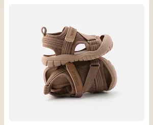 Close-up of children's breathable knitted sports sandals with closed-toe design