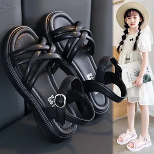 Stylish black cross-strap sandals for girls with soft soles and adjustable ankle buckles
