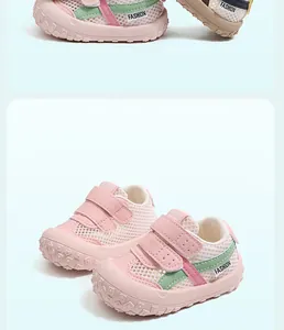 Breathable pink and green mesh toddler sports shoes with soft soles and velcro straps