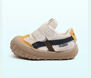 Close-up detail of breathable mesh toddler sneakers with comfortable soft rubber soles