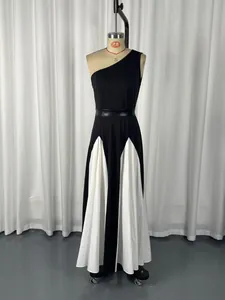 Elegant one-shoulder black and white color block maxi dress displayed on a mannequin.
