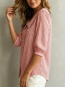 Detailed side view of a stylish red and white striped V-neck blouse with mid-length sleeves