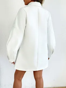 Back view of a chic oversized white woolen coat featuring elegant lantern sleeves and retro style