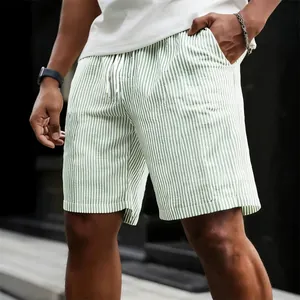 Men's green and white striped casual drawstring shorts with a relaxed summer fit