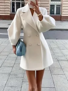 Elegant white short wool coat with lantern sleeves and double-breasted detail