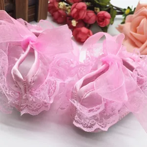Pink lace infant baby shoes with soft sole and elegant organza bow for first walkers
