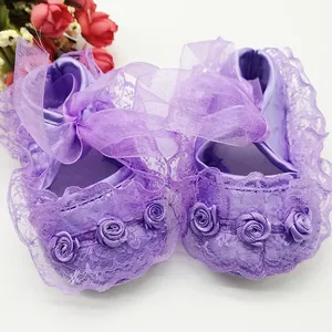 Purple lace baby walking shoes with soft non-slip soles and decorative ribbon bow