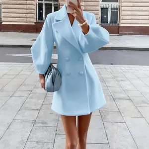 Vintage light blue coat with lantern sleeves and double-breasted design for women.