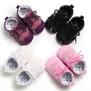 Detailed overhead view of four pairs of colorful baby leather walking shoes arranged in a circle