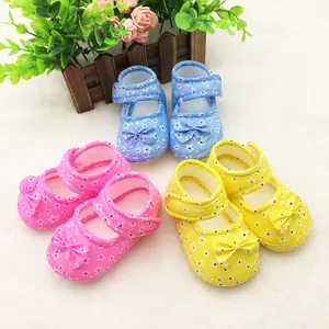 Floral soft-sole baby walker shoes with bows in pink, blue, and yellow for toddlers