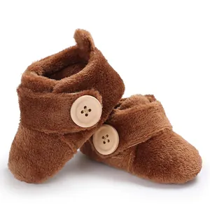 Ultra soft brown plush winter baby shoes with wooden button details for infants