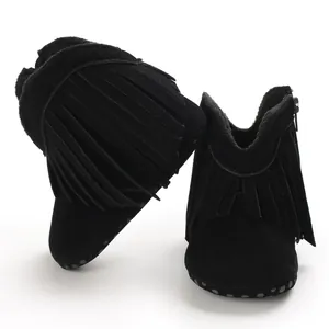Stylish black suede baby boots featuring elegant fringe detail and side zipper closure