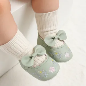 Sweet light green vintage floral embroidered baby princess shoes with a soft bow detail