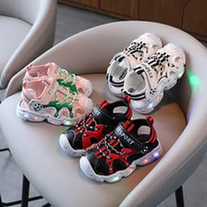 Durable kids' sports sandals featuring vibrant LED light-up soles in various colors