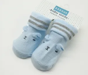 Pair of light blue 0-6 months baby socks featuring a bear face and striped cuffs