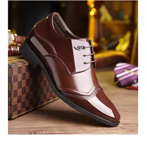 Close-up of elegant brown patent leather business shoes with 8cm hidden elevator heel