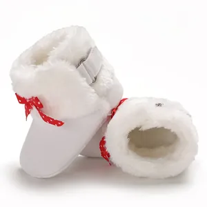 Botas de invierno para bebé blancas con pelo sintético suave y lazo rojo de lunares