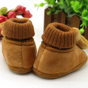 Warm brown winter baby walking shoes with 3D cartoon design and soft ribbed knit cuffs