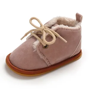Warmer Baby-Lernlaufschuh mit weichem Kunstfellfutter und robuster Gummisohle in Rosa