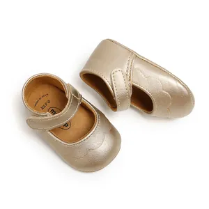 Detailed view of golden PU soft-soled baby princess shoes with soft soles and butterfly detail.