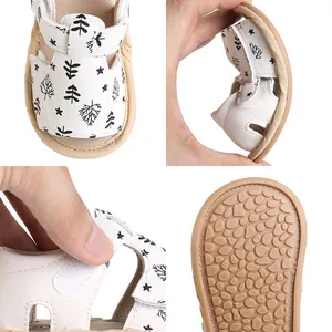 Detail view of soft flexible baby walking sandals with non-slip sole and Velcro strap closure