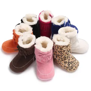 Colorful collection of warm winter baby snow boots featuring fringe and bow details