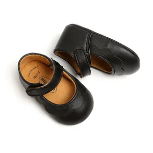 Detailed view of black PU leather baby Mary Jane shoes with lovely scalloped edges